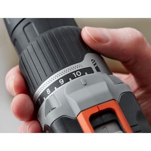 BLACK+DECKER cordless drill BCD003C1 close-up shows adjustable torque settings and orange accent.