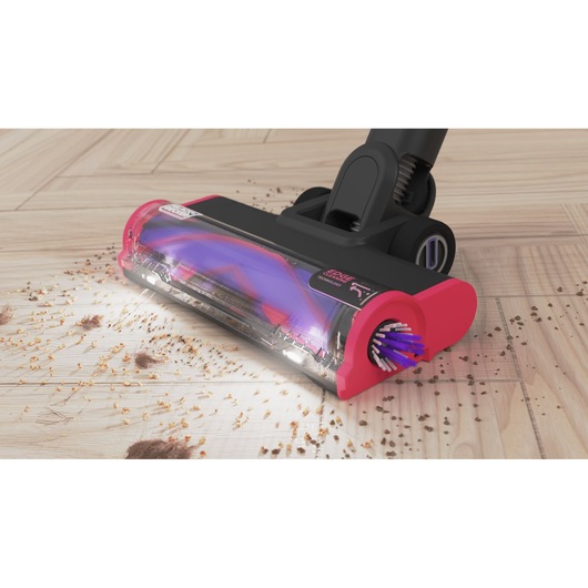 BLACKDECKER BHFEA640WG vacuum cleaner head close-up on hardwood floor picking up debris.